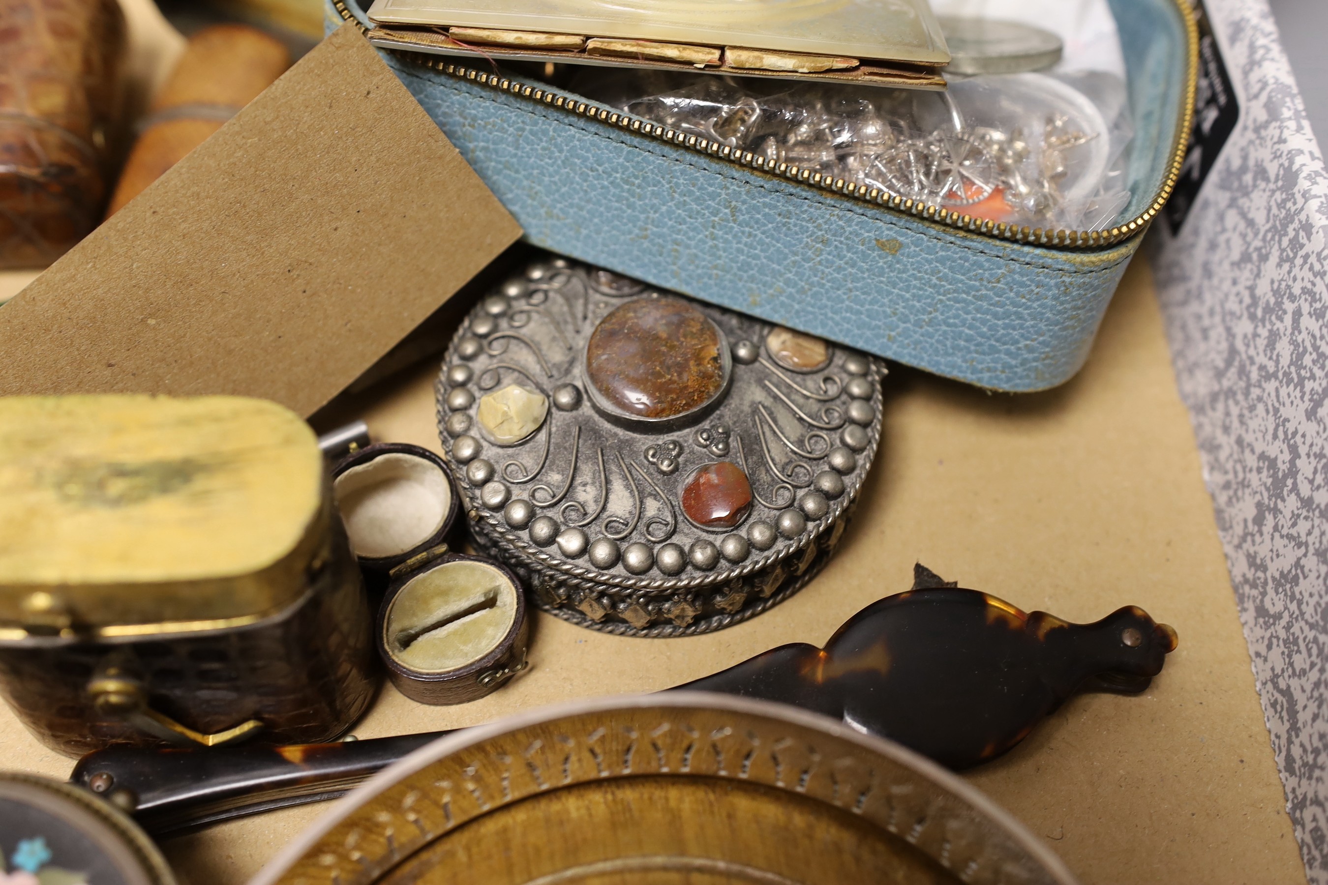 A mother-of-pearl sewing case, various charms and spoons etc